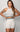 Mulher usando look fitness MK Fitwear com confiança e autoestima